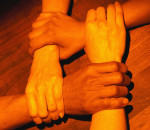Either a metaphor for mutual trust or four people who caught each other in the cookie jar. You decide.